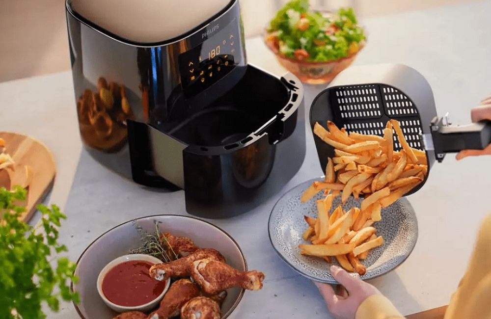 Nồi chiên không dầu có hâm thức ăn được không?